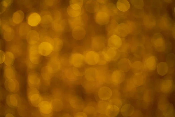 Fundo do bokeh dourado.Tema de celebração — Fotografia de Stock