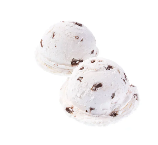 White ice cream with black chocolate pieces isolated on white background, diagonal composition — 스톡 사진