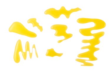 Beyaz arka planda izole edilmiş doğal bal lekeleri. Şurup damlası, nektar damlası..