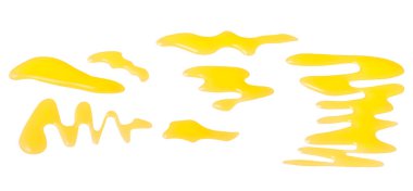 Beyaz arka planda izole edilmiş tatlı bal damlaları. Yatay bileşim.