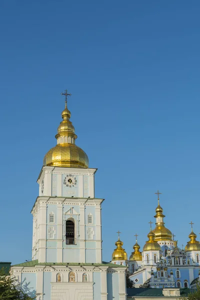Golden domes of St. Michael Cathedral in Kiev, Ukraine. St. Michael\'s Golden-Domed Monastery - famous church complex in Kiev, Ukraine. vertical photo.