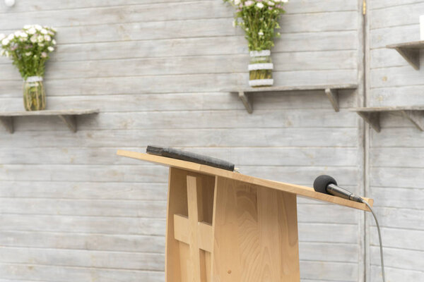Wooden pulpit for the preacher.