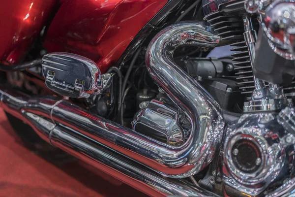 Close up view of a shiny motorcycle engine. vintage close up of motorcycle exhaust, noise