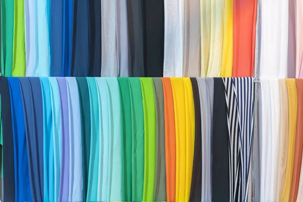 Photo picture Samples of colored cloth background texture. crumpled fabric