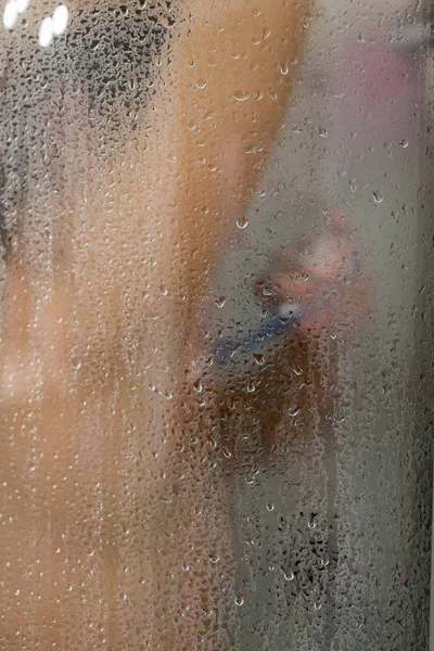 Beautiful woman taking shower in her bathroom and shaving her armpits. Unwanted hair detected concept — Stock Photo, Image
