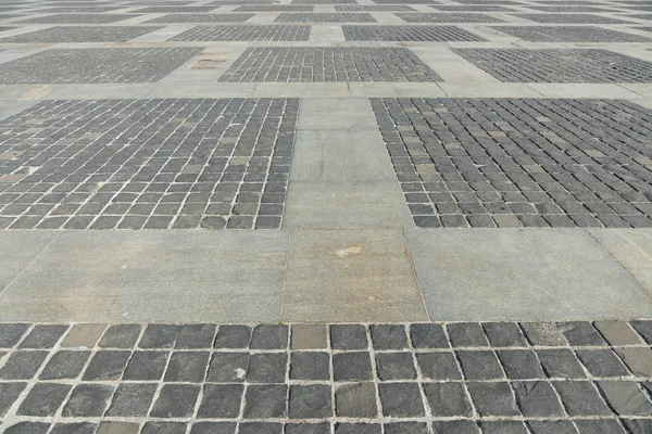 Stone Square. Estrada velha de pedras. fundo de pedra cinza — Fotografia de Stock