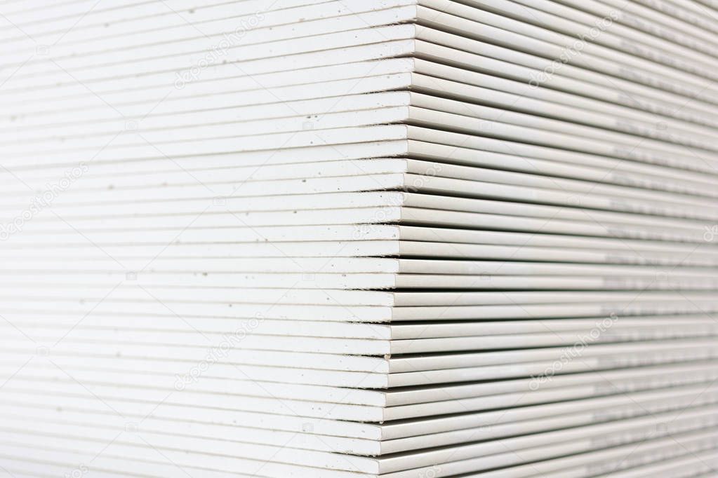 The stack of gypsum boards preparing for construction.