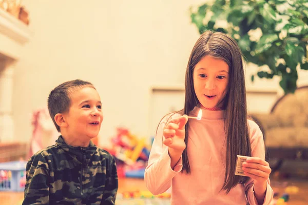 Small Children Playing Fire Home Child Plays Matches Foreground Burning — Stock Photo, Image