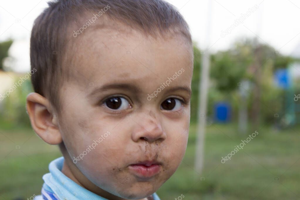 sad dirty little boy Angry, sad and unhappy baby child. oncept for bullying, depression stres