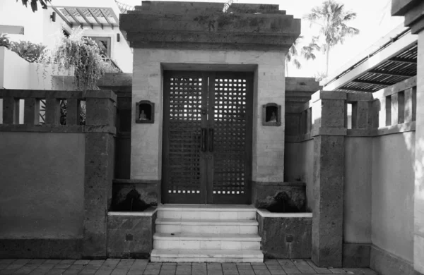Entrance gate to the plot of the villa in Sanur on the island of Bali in Indonesia