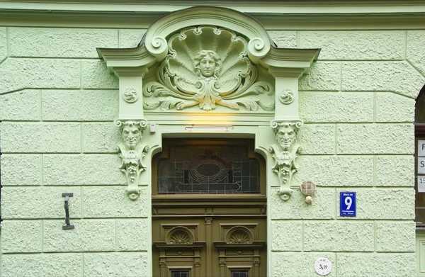 Fragment of the design of the main entrance to the building — Stock Photo, Image