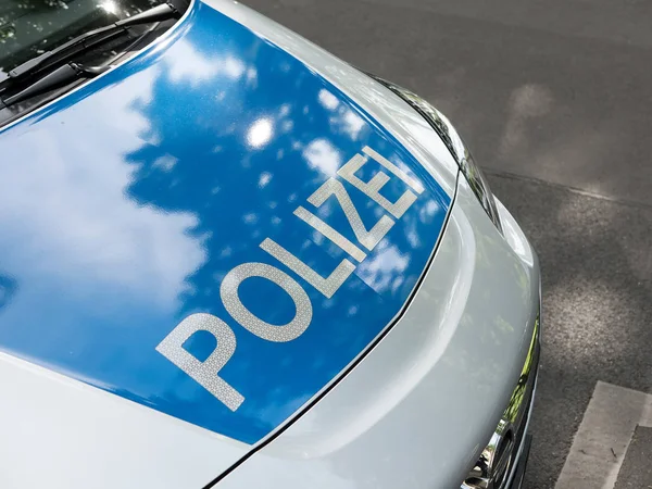 Nachrichtenkonzept: blaues Polizeiauto, ausgewählter Schwerpunkt — Stockfoto