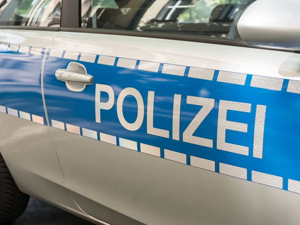 Nachrichtenkonzept: blaues Polizeiauto, ausgewählter Schwerpunkt — Stockfoto