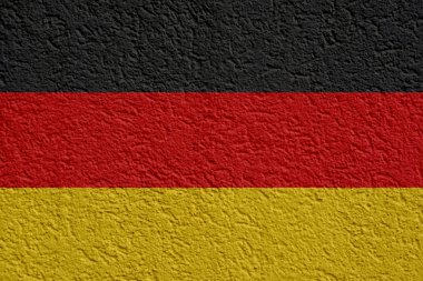 Almanya siyaset veya iş kavramı: Alman bayrağı duvar sıva, doku ile