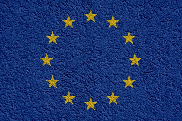 Europeiska unionens politik eller affärsidé: Eu-flaggan vägg med gips, textur — Stockfoto