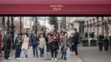 Tourists In Front of Hotel Adlon Kempinski On Unter Den Linden In Berlin clipart