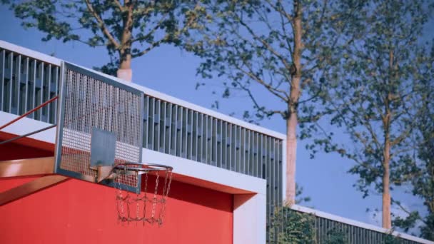 Orange Black Ball Flies Basketball Court Misses Basketball Hoop Metal — Stock Video