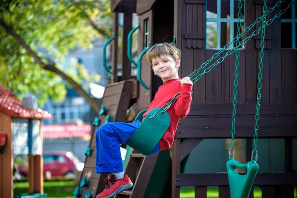 Smiling Little Boy His Brother Friend Swing Children Playing Outdoors — Stock Photo, Image