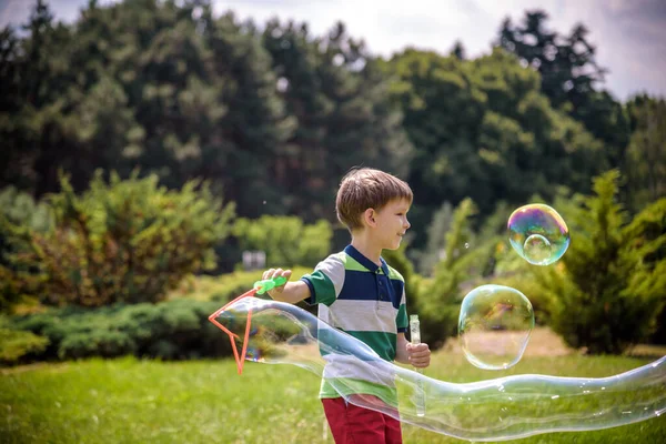 Little Boy Playing His Soap Bubbles Toy Park Child Activity — Stock Photo, Image