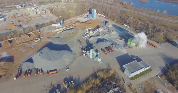 Concrete plant near a big road. Aerial. — Stock Video