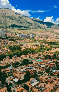 Bello, Antioquia, Colombia. March 30, 2021: Panoramic cityscape in beautiful with buildings and blue sky.