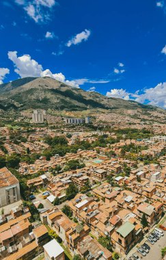 Bello, Antioquia, Colombia. March 30, 2021: Panoramic cityscape in beautiful with buildings and blue sky.