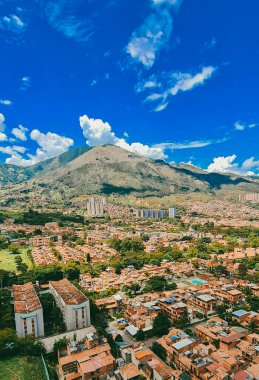 Bello, Antioquia, Colombia. March 30, 2021: Panoramic cityscape in beautiful with buildings and blue sky.