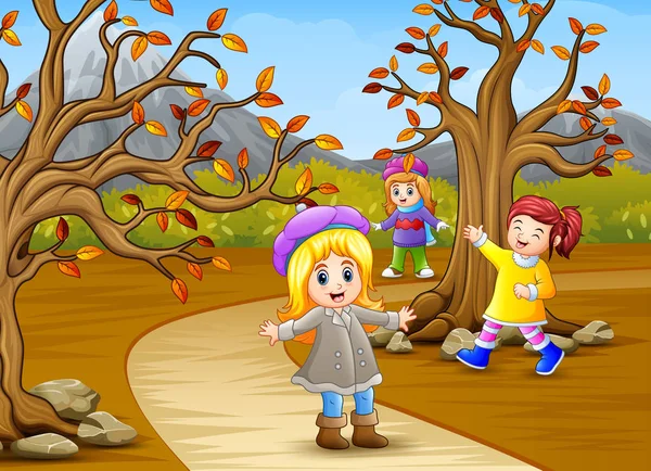 Счастливые Дети Играют Осеннем Парке — стоковый вектор