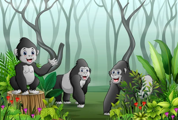 A group of gorillas in a forest with dry tree branches background