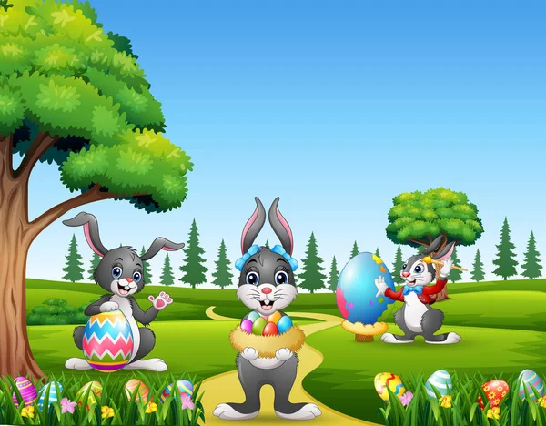 Счастливые Пасхальные Кролики Держат Красят Яйца — стоковый вектор