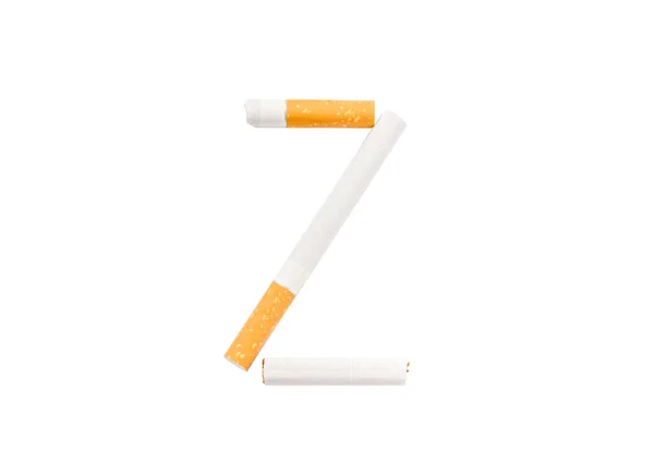 Cigarety složené ve tvaru písmene "Z" na bílém pozadí — Stock fotografie