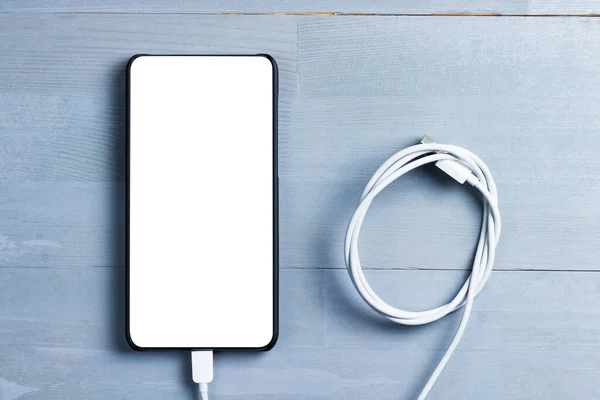 Bisel Menos Teléfono Inteligente Con Pantalla Blanco Cable Alimentación Sobre —  Fotos de Stock