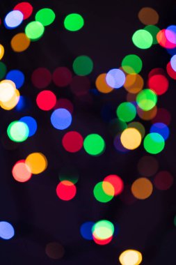 Birçok renkli Noel ışıkları arka plan olarak Bokeh 'in dikkatini dağıttı.
