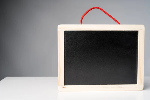 Blank School Blackboard Chalkboard Wooden Frame White Table Copy Space — Stock Photo, Image
