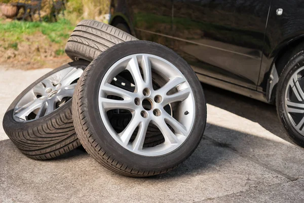 Summer Wheels Lying Car Winter Tires Seasonal Tyre Change Abstract — Stock Photo, Image