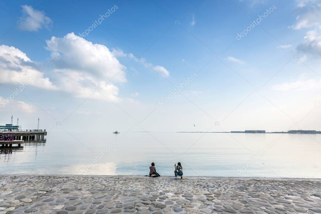 Tourists enjoying a late afternoon in Baku