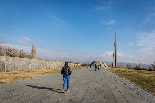 Yerevan, Armenia - Jan 9th 2018 - Tourist at the Armenian Genocide memorial complex is Armenia's official memorial dedicated to the victims of the Armenian Genocide