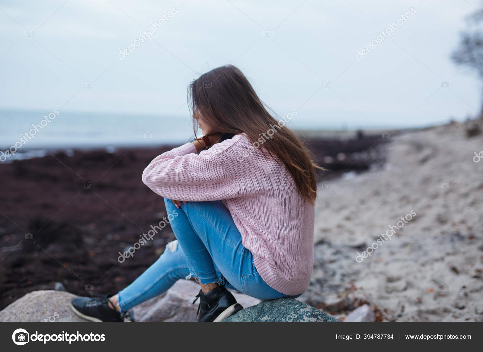 Sad Depressed Young Woman Sitting Beach Sea Alone Embracing Her ...