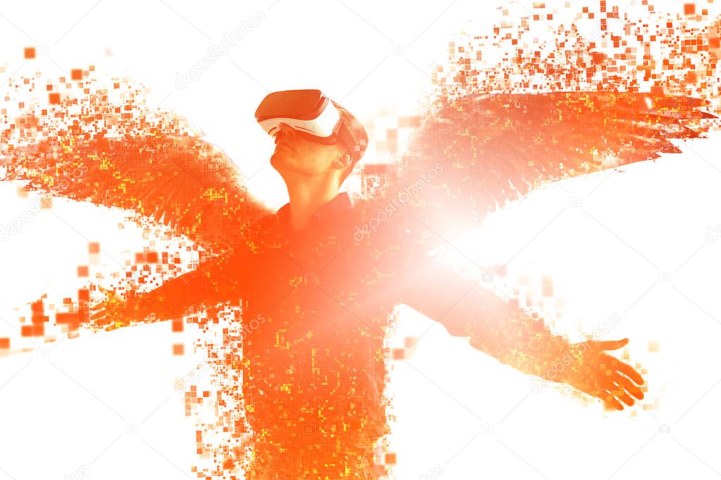 The person in glasses of a virtual reality with wings is scattered on pixels. The concept of new technologies and technologies of the future.VR glasses