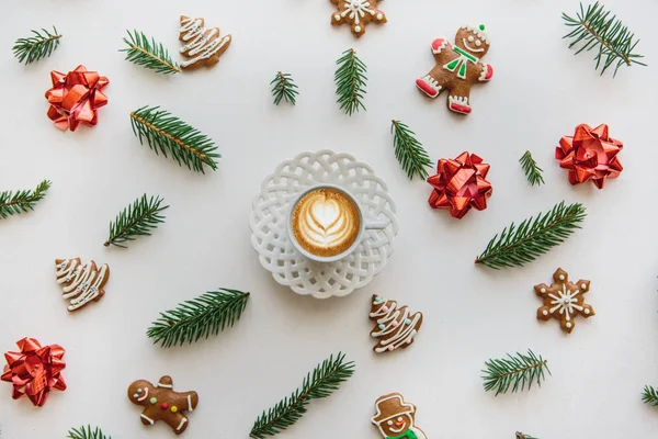A cup of freshly flavored cappuccino coffee. Near the scenery in the Christmas or New Years style. — Stock Photo, Image