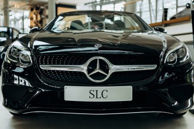 A close-up of the new black cabriolet Mercedes-Benz SLC. clipart