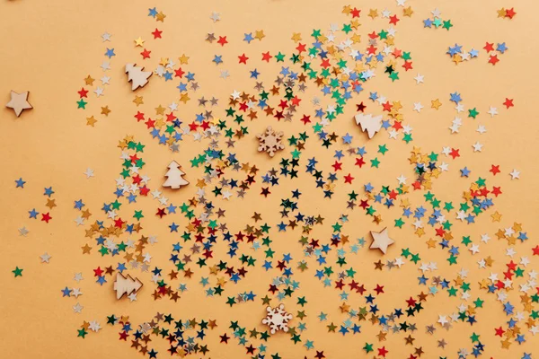 Festive background of multi-colored confetti stars — Stock Photo, Image