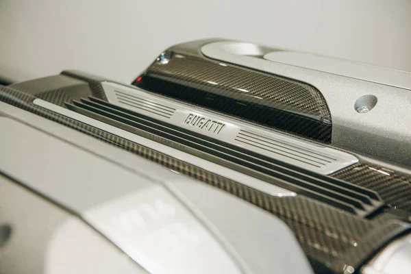 Closeup sign of Bugatti on the engine of a new sports car. Stock Image