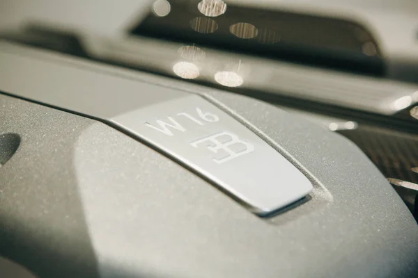 Closeup sign of Bugatti on the engine of a new sports car. Royalty Free Stock Images
