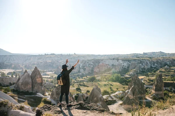 A girl raises hands up showing how he is free and happy. — Stock Photo, Image