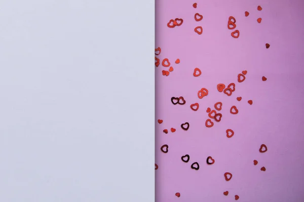 Sok szív, egy rózsaszín háttér, és egy hely, a szöveg mellett — Stock Fotó