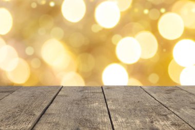 Altın bokeh soyut arkaplanda ahşap masa üstü