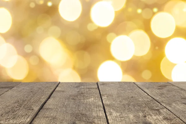Altın bokeh soyut arkaplanda ahşap masa üstü