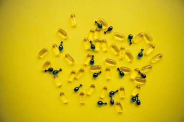 Omega 3, hyaluronik asit ile kapsül arka plan. Cilt ve vücut sağlığı için bakım