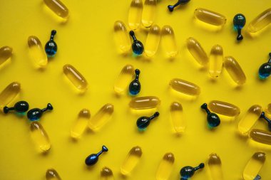 Omega 3, hyaluronik asit ile kapsül arka plan. Cilt ve vücut sağlığı için bakım